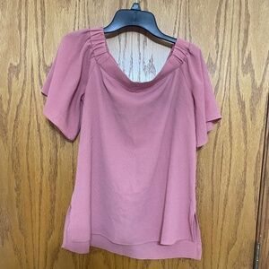 Off the shoulder pink flutter sleeve top.